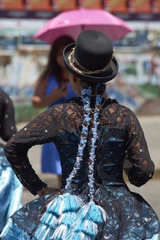 Morenada dancer in traditional Andean costume performing at the annual Carnaval Andino con la Fuerza del Sol in Arica, Chile.