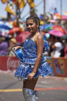 Morenada dancers in traditional Andean costume performing at the annual Carnaval Andino con la Fuerza del Sol in Arica, Chile.