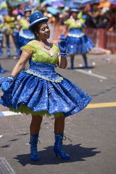 Morenada dancers in traditional Andean costume performing at the annual Carnaval Andino con la Fuerza del Sol in Arica, Chile.