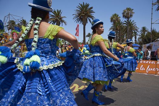 Morenada dancers in traditional Andean costume performing at the annual Carnaval Andino con la Fuerza del Sol in Arica, Chile.