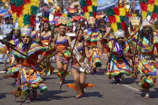 Tobas dance group in traditional Andean costumes performing at the annual Carnaval Andino con la Fuerza del Sol in Arica, Chile.