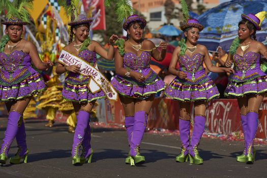 Morenada dancers in traditional Andean costume performing at the annual Carnaval Andino con la Fuerza del Sol in Arica, Chile.