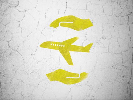 Insurance concept: Yellow Airplane And Palm on textured concrete wall background