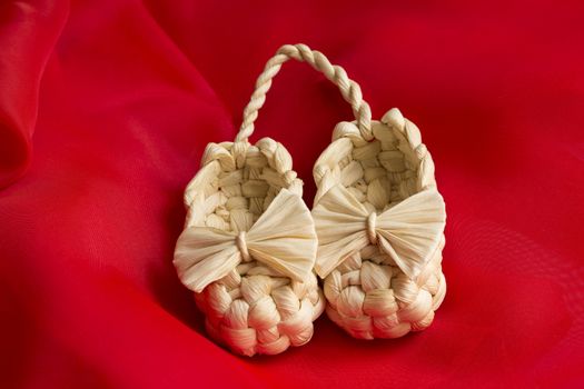 souvenir shoeson the texture of the on a red silk