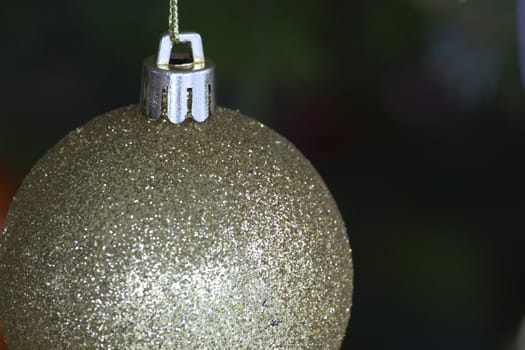 Decorated christmas tree with beautiful toys on it.