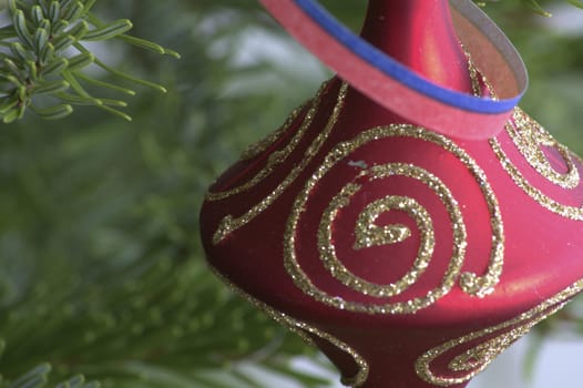 Decorated christmas tree with beautiful toys on it.