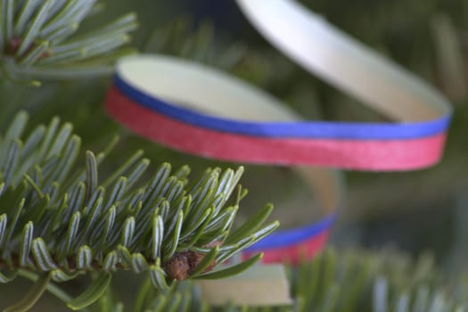 Decorated christmas tree with beautiful toys on it.