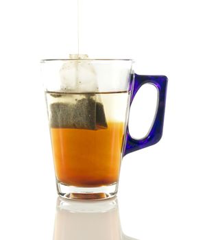 transparant glass with teabag in water