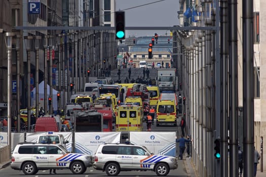 BELGIUM, Brussels: Police and emergency vehicles are pictured near Maelbeek station in Brussels, which has been evacuated after an explosion on March 22, 2016. Brussels' public transport company STIB-MIVB has confirmed 15 deaths and 55 injured people after an explosion at the Maelbeek - Maalbeek subway station. This morning at least 13 people have been killed after two explosions in the departure hall of Brussels Airport in Zaventem. Government sources speak of a terrorist attack. The terrorist threat level has been heightened to four across the country.
