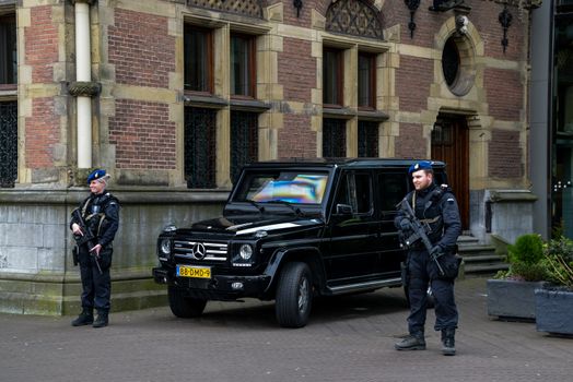 NETHERLANDS, the Hague: Members of the Royal Military Police stand by as the Hague, the Netherlands is on high alert following the deadly attacks in Brussels, Belgium on March 22, 2016. The attacks, at least one of which was carried out by a suicide bomber, left at least 30 dead at Zaventem airport and Maelbeek metro station.