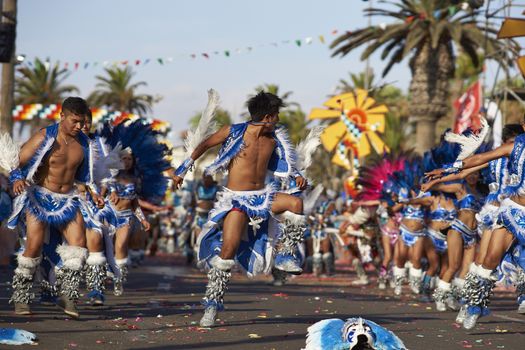 Tobas dancer in traditional Andean costume performing at the annual Carnaval Andino con la Fuerza del Sol in Arica, Chile.