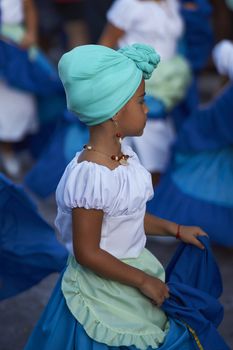 Group of dancers of Africa descent Afrodescendiente performing at the annual Carnaval Andino con la Fuerza del Sol in Arica, Chile.