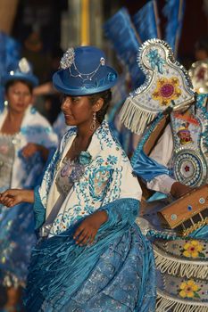 Morenada dancer in traditional Andean costume performing at the annual Carnaval Andino con la Fuerza del Sol in Arica, Chile.