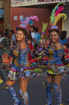 Morenada dancers in traditional Andean costume performing at the annual Carnaval Andino con la Fuerza del Sol in Arica, Chile.