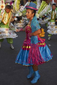 Morenada dancers in traditional Andean costume performing at the annual Carnaval Andino con la Fuerza del Sol in Arica, Chile.