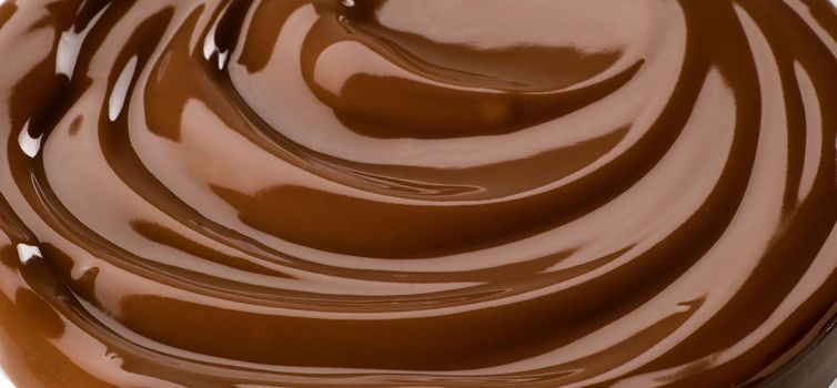 Macro shot of a silky chocolate swirl