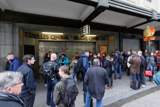 BELGIUM, Brussels: Dozens of people are seen outside the Brussels-Central train station as hundreds have been evacuated on March 22, 2016 following the attacks that hit the Belgian capital.