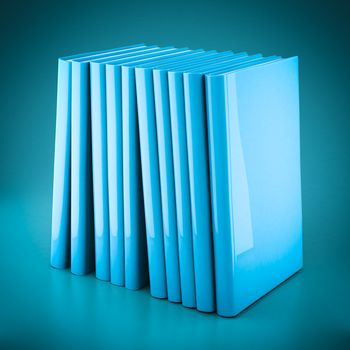 Stack of new books on a blue background