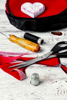 Sewing tool for needlework and leather scraps