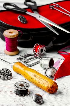 Sewing tool for needlework and leather scraps