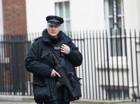 UK, London: Armed police patrols were on Downing Street during the emergency COBRA meeting on March 22, 2016, in London.The meeting at 10 Downing Street, came after a series of bombings left at least 30 people dead in the Belgian capital of Brussels earlier in the day.