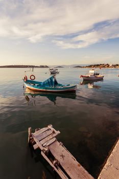 Boats moored in the Aegean sea at the town of Ayvalik in Turkey.