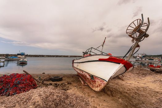 Fishing boat on beach seaside near Troy in Turkey