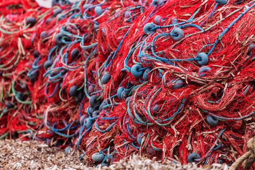 Fishing nets piled on beach at seaside near Troy in Turkey