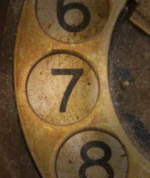 Close up of Vintage phone dial, dirty and scratched - 7