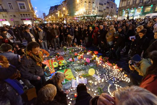 BELGIUM, Brussels: Thousands gather around a makeshift memorial to pay tribute and mourn the victims of the bomb attacks, at the Place de la Bourse, in Brussels, Belgium, March 22, 2016.