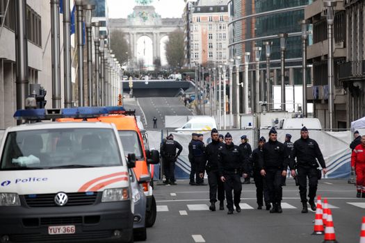 BELGIUM, Brussels: Police officers are pictured in the area of the explosion at the Maelbeek - Maalbeek subway station in Brussels, on March 22, 2016. In the morning two bombs exploded at the departure hall of Brussels Airport and another one at the Maelbeek - Maalbeek subway station, which killed around 30 people.
