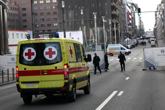 BELGIUM, Brussels: An ambulance arrives at the area of the explosion at the Maelbeek - Maalbeek subway station in Brussels, on March 22, 2016. In the morning two bombs exploded at the departure hall of Brussels Airport and another one at the Maelbeek - Maalbeek subway station, which killed around 30 people.