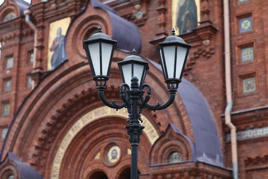 street lamp in the classical style of the church