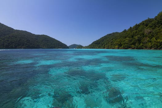 Tropical beach against blue sky at Koh Mai ngam in Surin Islands national park in Phang Nga, Thailand