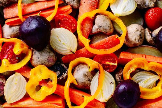 vegetarian dish of roasted tomatoes,peppers,potatoes and mushrooms