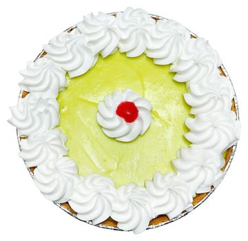keylime pie with meringue topping and cherry in center isolated over white background