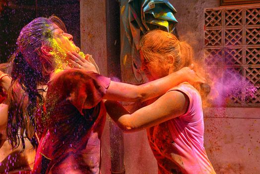 INDIA, Jodhpur: Indian people celebrate the Holi festival in Jodhpur on March 23, 2015. Holi, the Hindu spring festival or 'Festival of Colours' is celebrated with coloured powder and water and marks the end of winter and the beginning of spring. 