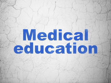 Education concept: Blue Medical Education on textured concrete wall background