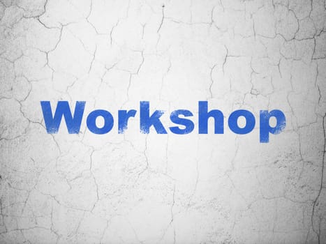 Education concept: Blue Workshop on textured concrete wall background