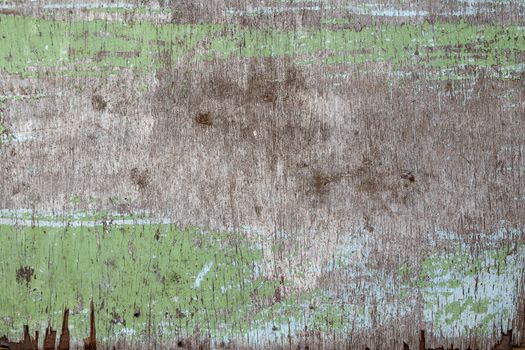 fragment of old dirty plywood, wooden background