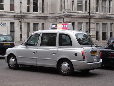 UNITED KINGDOM, London : Tributes to the victims of the terror attacks in Brussels are seen on taxi cabs in central London on March 23, 2016.Security was tightened across Europe and transport links paralysed after a series of apparently coordinated explosions ripped through Brussels airport and a metro train, killing at least 35 people.