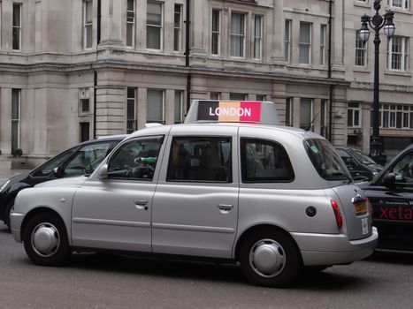 UNITED KINGDOM, London : Tributes to the victims of the terror attacks in Brussels are seen on taxi cabs in central London on March 23, 2016.Security was tightened across Europe and transport links paralysed after a series of apparently coordinated explosions ripped through Brussels airport and a metro train, killing at least 35 people.