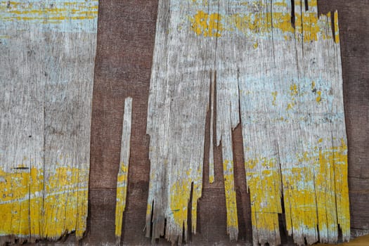 fragment of old dirty plywood, wooden background