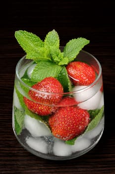 Refreshing summer drink with strawberry and mint in  glasses  