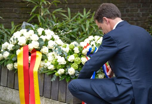 NETHERLANDS, The Hague: Dutch Prime Minister Mark Rutte lays a wreath at the Belgium Embassy on March 23, 2016, for the victims of the terror attacks in Brussels.Mourners laid flowers a day after bombings at a subway station and airport left 30 people dead and hundreds wounded in neighboring Belgium. 