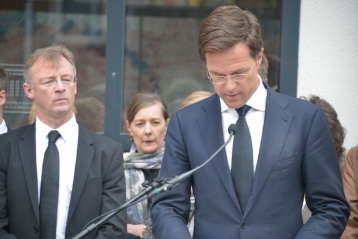 NETHERLANDS, The Hague: Dutch Prime Minister Mark Rutte speaks at a ceremony at the Belgium Embassy on March 23, 2016, for the victims of the terror attacks in Brussels.Mourners laid flowers a day after bombings at a subway station and airport left 30 people dead and hundreds wounded in neighboring Belgium. 
