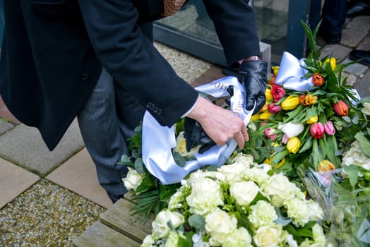 NETHERLANDS, The Hague: People placed flowers at the Belgium Embassy on March 23, 2016, for the victims of the terror attacks in Brussels.Mourners laid flowers a day after bombings at a subway station and airport left 30 people dead and hundreds wounded in neighboring Belgium. 