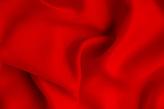 the texture of the red fabric from the delicate chiffon