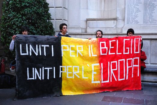 ITALY, Padova: Members of a flash mob in Padova, Italy hold a sign on March 23, 2016 as a show of solidarity with the victims of the terror attacks in Brussels, Belgium the day previous. On March 22, a series of bombings killed at least 30 people and injured hundreds of others, both at Zaventem airport and at Maelbeek metro station. The Islamic State terror group has since claimed responsibility for the attack.