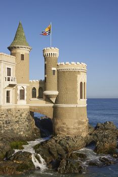 Historic building Wulff Castle built on the rocky Pacific coast of central Chile at Vina del Mar.